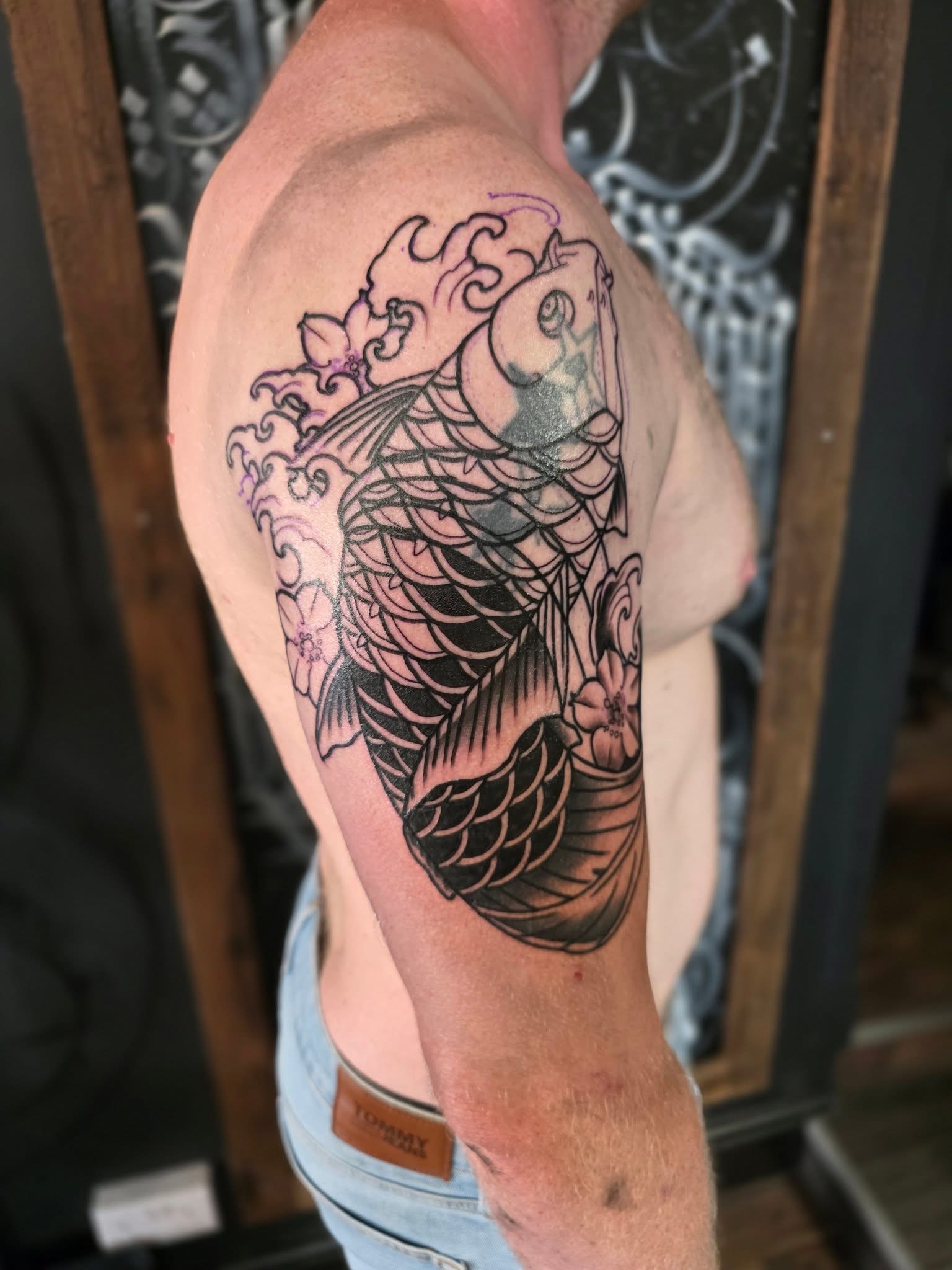 Illustrative blackwork portrait tattoo by Michael Lisney
